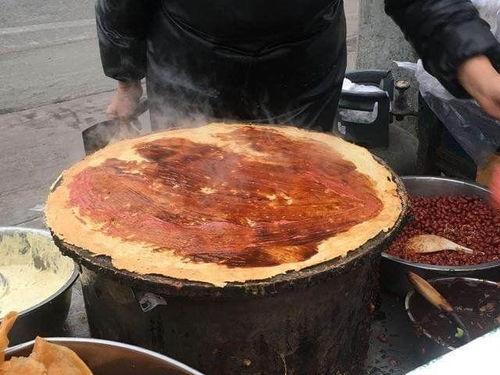 吃瓜卖煎饼网红是谁的徒弟,吃瓜卖煎饼网红背后的神秘徒弟身份！”